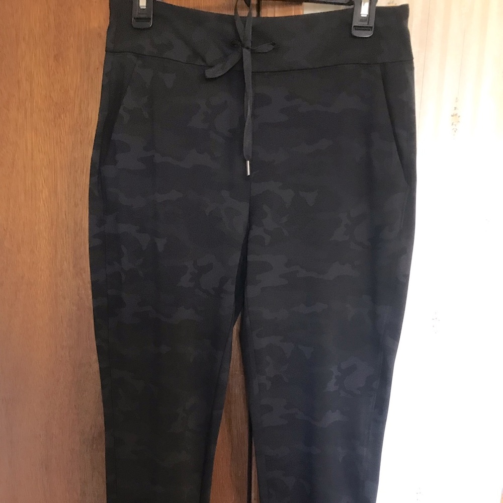 Rachel Zoe, Long Camo pants with tie front and pockets.